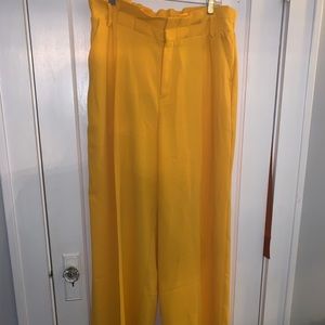 Yellow paper bag, wide leg pants